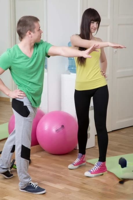 Brunette teen with long hair goes ass to mouth with her yoga instructor