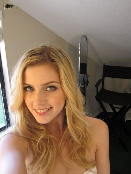 Teenage blondie in white lace Abigaile Johnson baring her small boobs