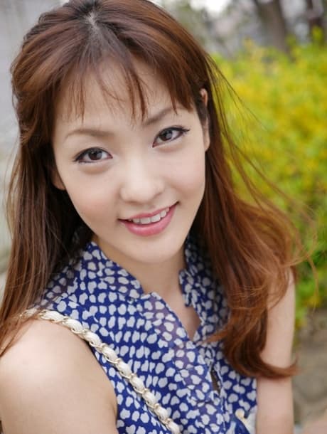 Brunette Asian girl Nami Honda gives a blowjob after showing her left tit