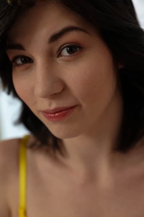 Brunette sexpot Nessie Blue showing off her hot ass & her shaved coochie