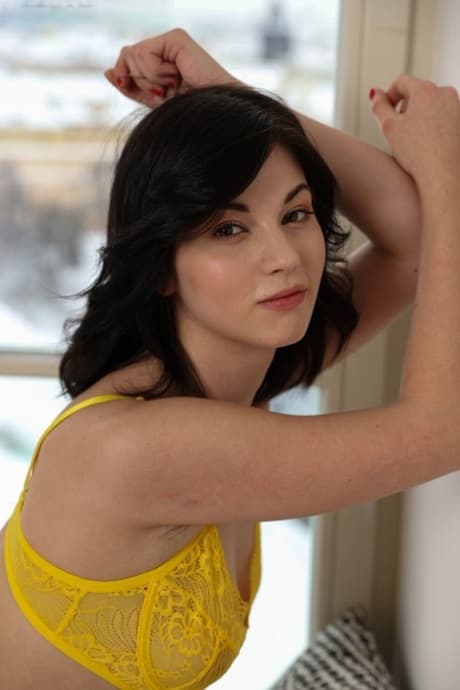 Brunette sexpot Nessie Blue showing off her hot ass & her shaved coochie