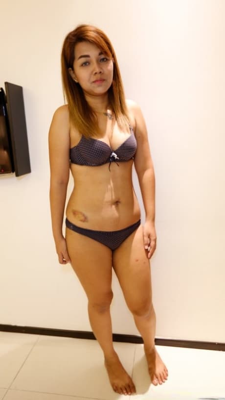 Petite Asian teen Puy C removes her clothes and takes a boner from behind