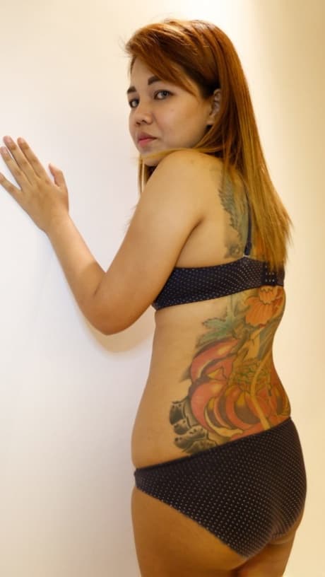 Petite Asian teen Puy C removes her clothes and takes a boner from behind