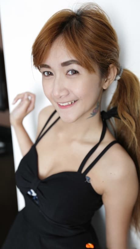 Dirty Asian girl An C shows her ass and takes a fat boner in her bushy cunt