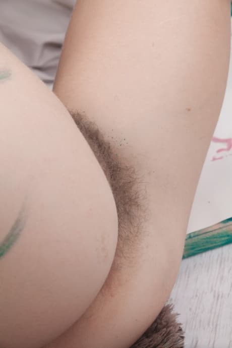 Slim teen Alecia Fox shows her hairy armpits & pussy & finger fucks on a couch